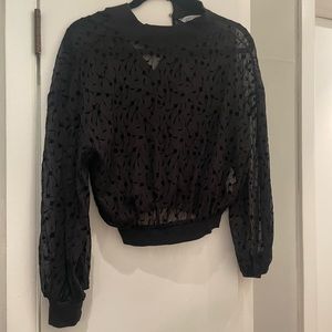 Sheer black blouse